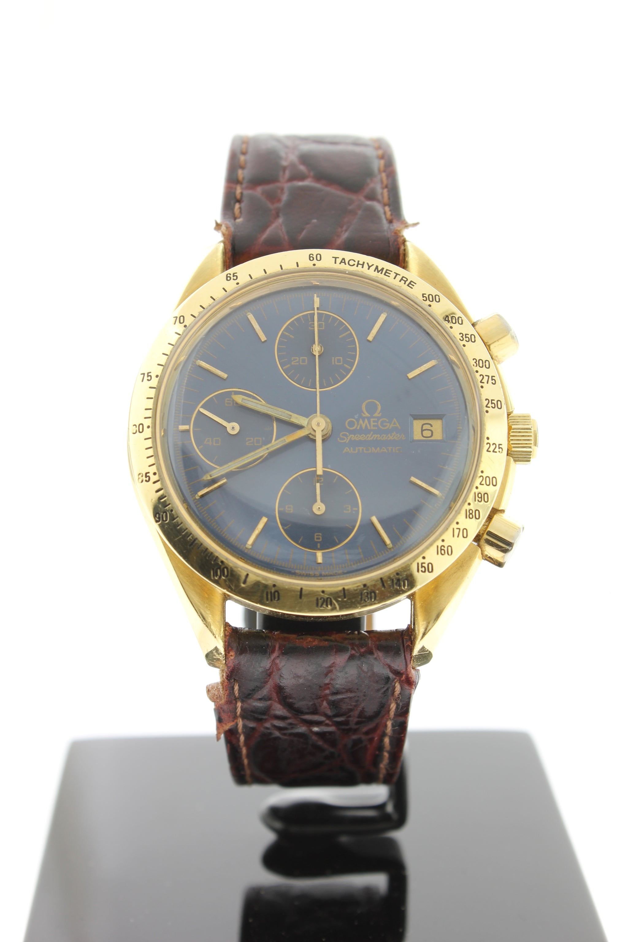 Omega speedmaster gold bezel sale